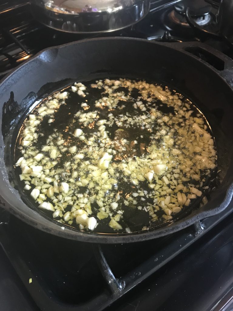 Saute the garlic in olive oil
