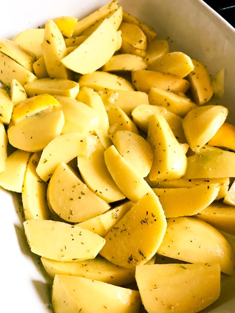 Coat Potatoes in Lemon, Olive Oil, Garlic, Oregano & Salt and Pepper