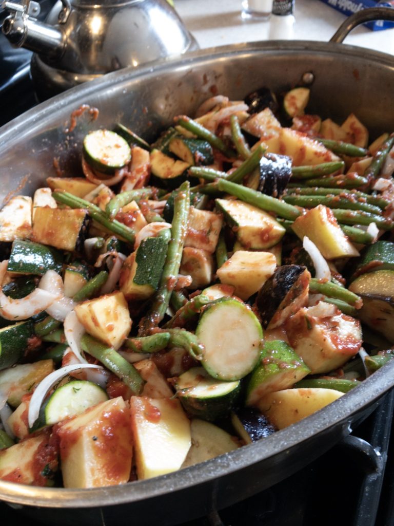 Tourlou Tourlou is a Greek dish of roasted zucchini, green beans, potatoes, onions and garlic in tomato auce.