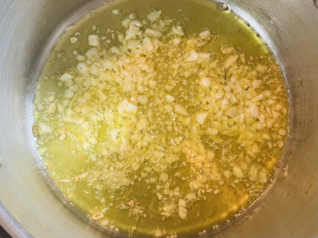 Fragrant garlic simmering in olive oil